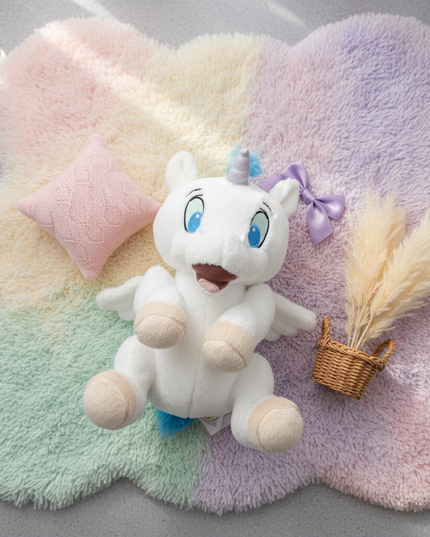 tiny plush unicorn - flat-lay