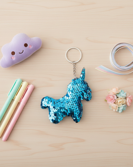 tiny unicorn keychain - flat-lay