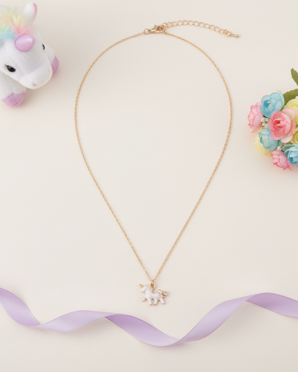 tiny unicorn necklace - flat-lay
