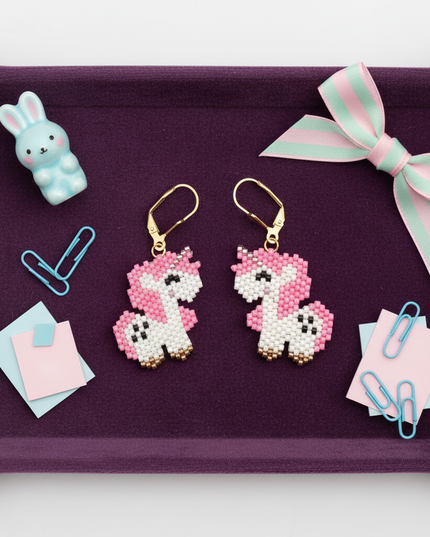 unicorn beaded earrings - flat-lay