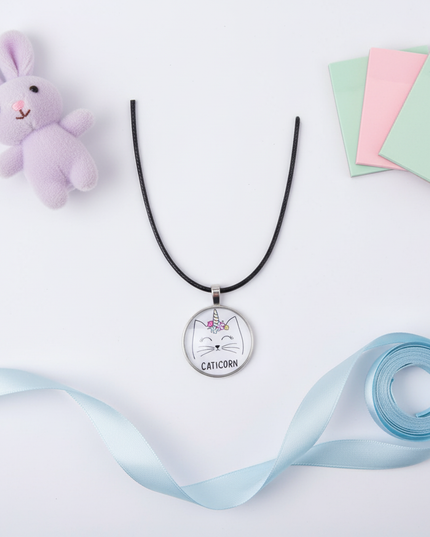 unicorn cat necklace - flat-lay