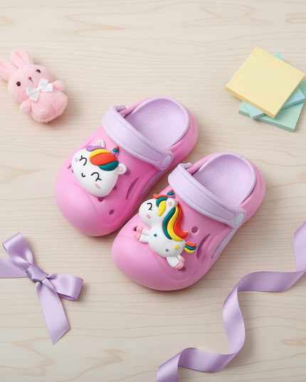 unicorn charm clogs - flat-lay