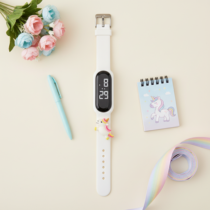 unicorn digital watch - flat-lay