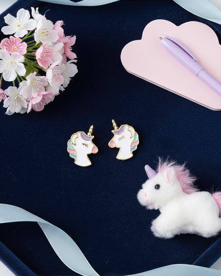 unicorn earrings for little girl - flat-lay