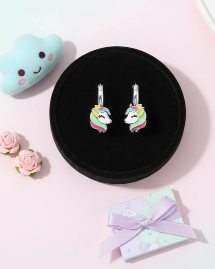 unicorn earrings for sensitive ears - flat-lay