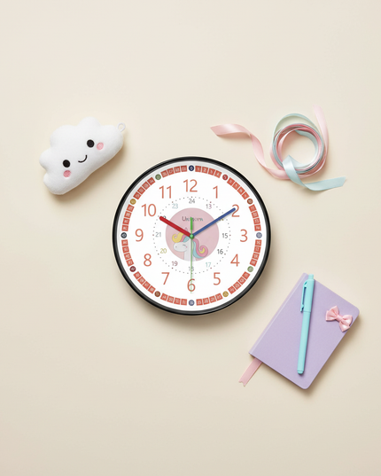 unicorn educational wall clock - flat-lay