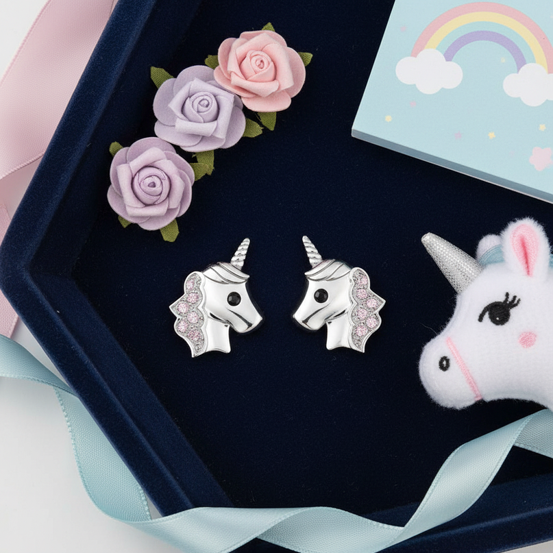 unicorn emoji earrings - flat-lay