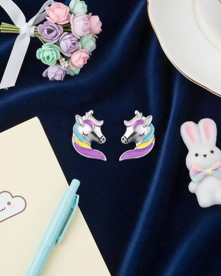 unicorn head earrings - flat-lay