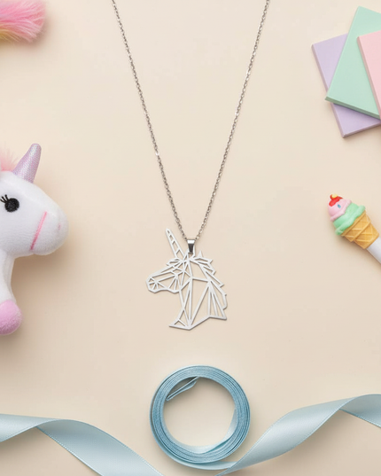 unicorn head necklace - flat-lay