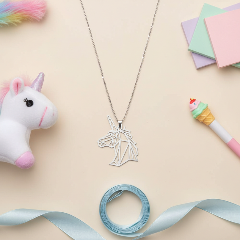 unicorn head necklace - flat-lay