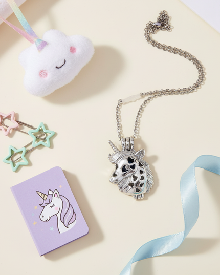 unicorn head pearl necklace - flat-lay