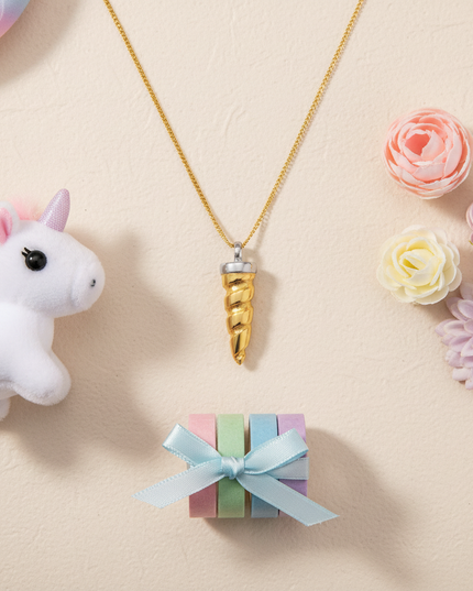 unicorn horn pendant - flat-lay