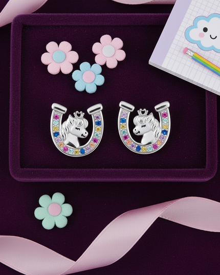 unicorn horseshoe earrings - flat-lay