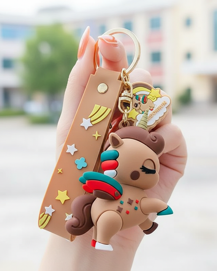 unicorn mini backpack keychain - in-use