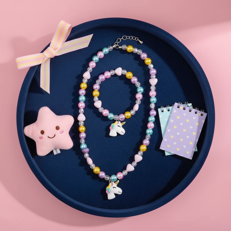 unicorn necklace little girl - flat-lay