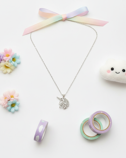unicorn necklace with pearl - flat-lay