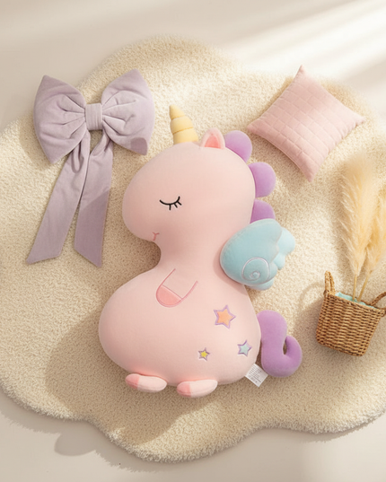 unicorn plush throw pillow - flat-lay