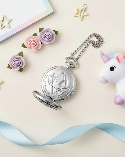 unicorn pocket watch - flat-lay