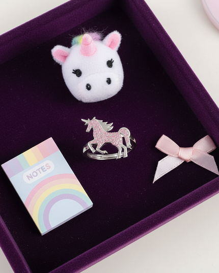 pink unicorn ring - flat-lay