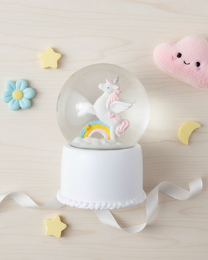 unicorn snow globe music box - flat-lay