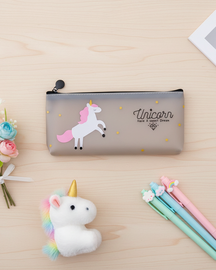 unicorn transparent pencil case - flat-lay