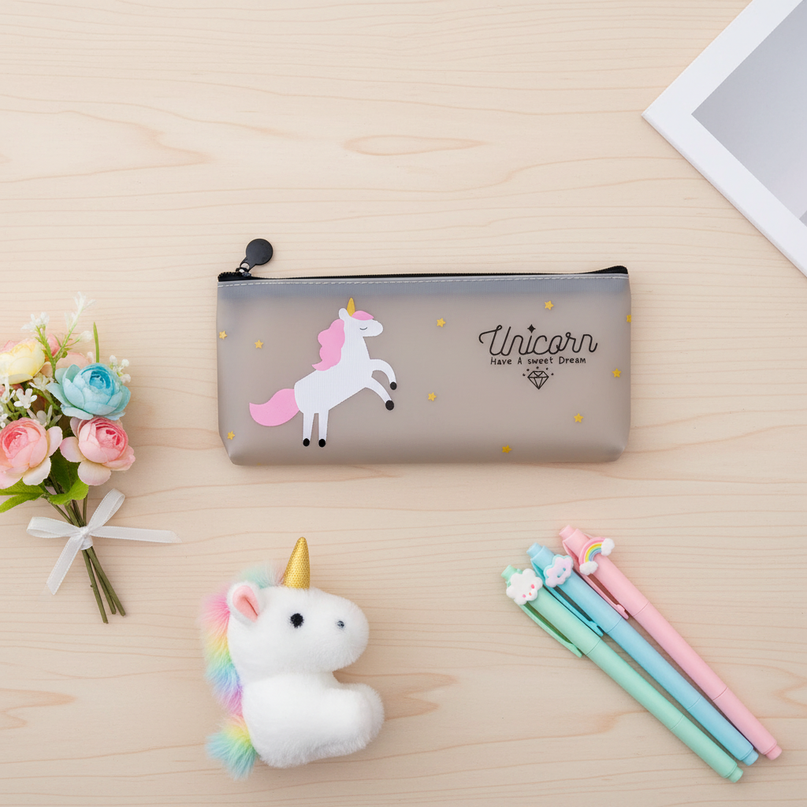 unicorn transparent pencil case - flat-lay