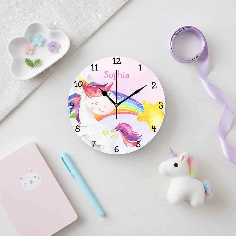 unicorn wall clock with rainbow - flat-lay