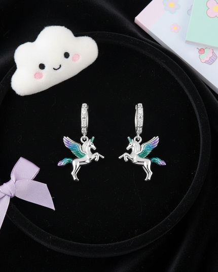 unicorn wings earrings - flat-lay