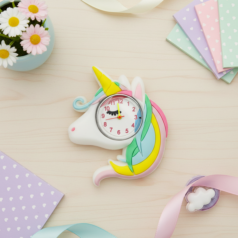 unicorn winking watch - flat-lay