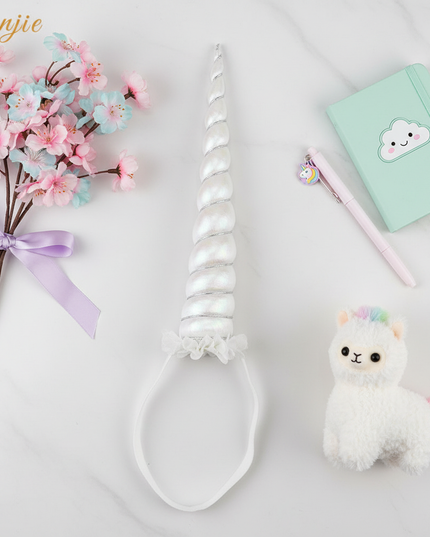 white unicorn horn for cosplay - flat-lay