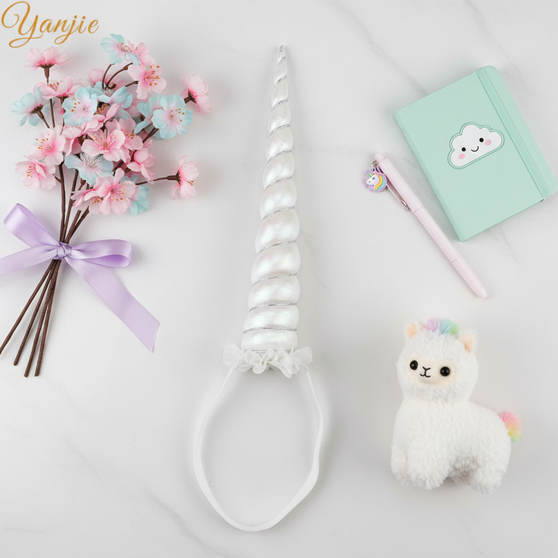 white unicorn horn for cosplay - flat-lay