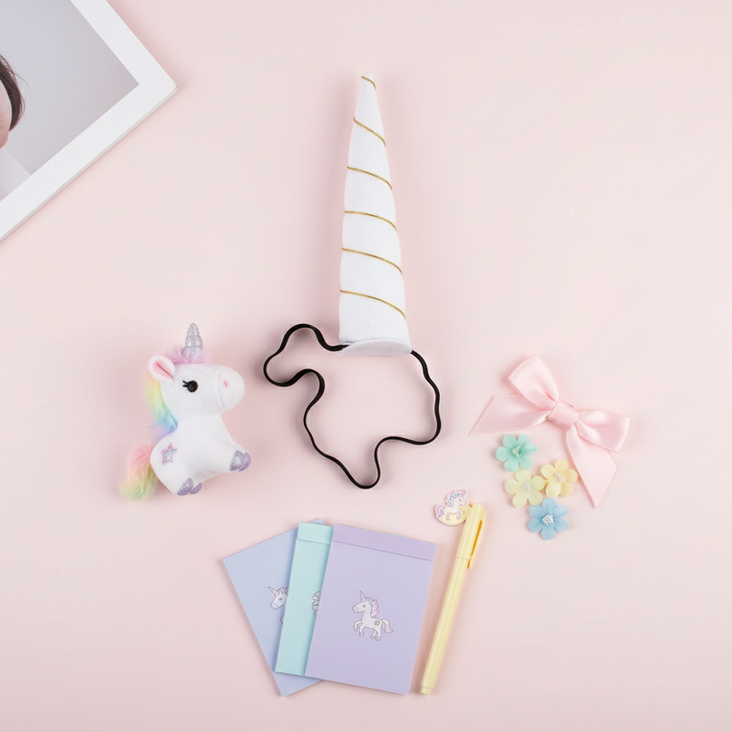 white unicorn horn headband - flat-lay