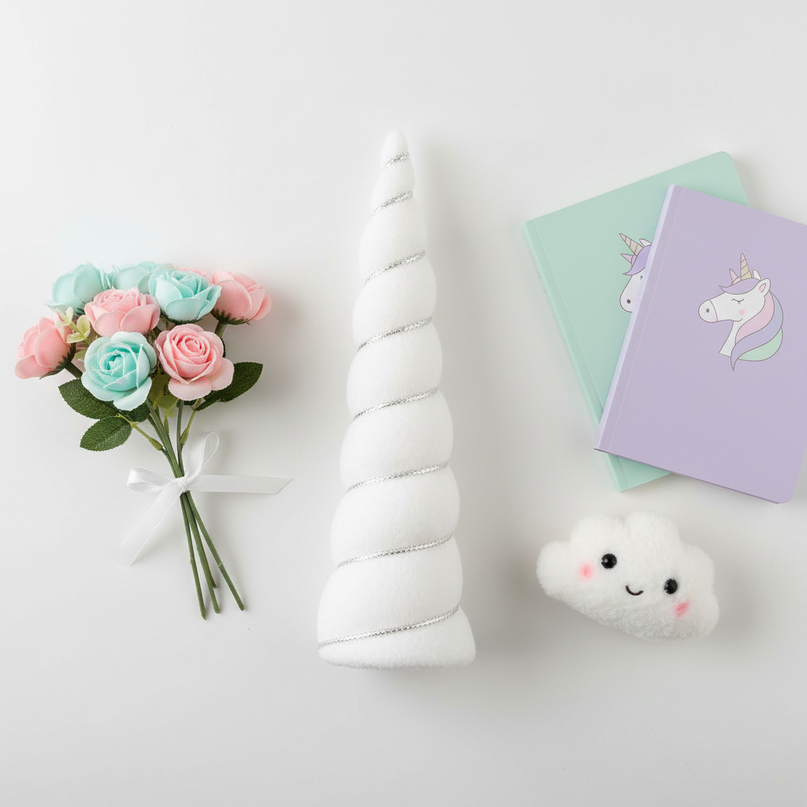 white unicorn horn party set - flat-lay