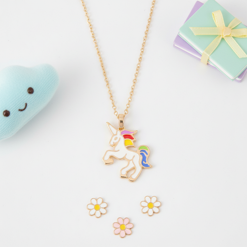 white unicorn necklace - flat-lay