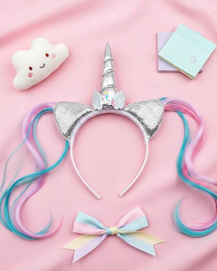 white unicorn wig headband - flat-lay