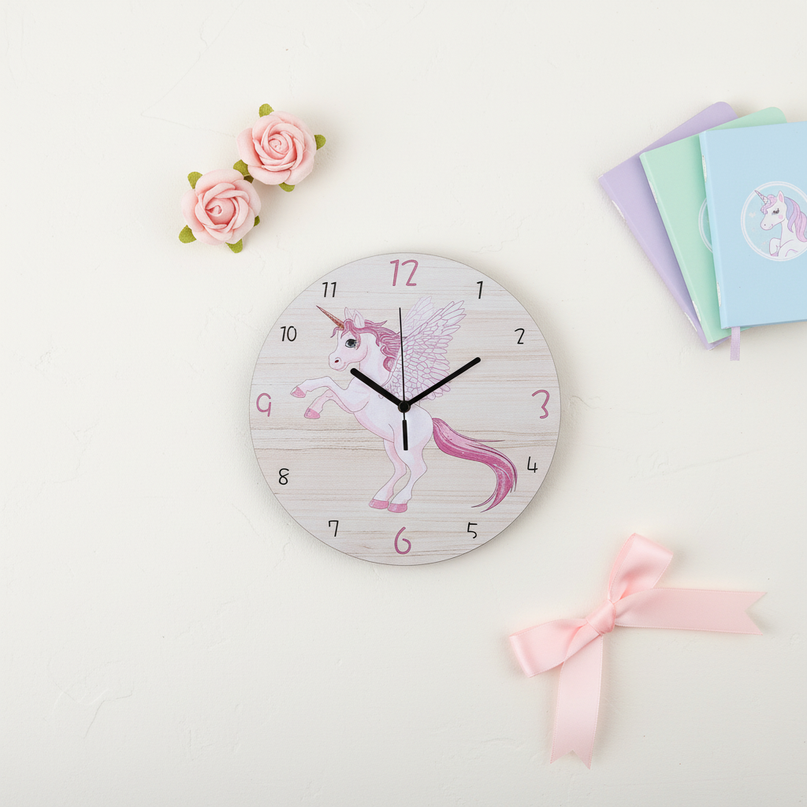 wooden alicorn clock - flat-lay