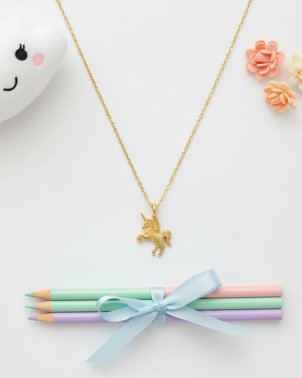 yellow unicorn necklace - flat-lay