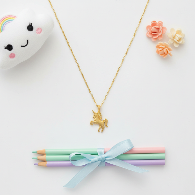 yellow unicorn necklace - flat-lay